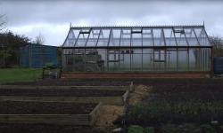 A greenhouse on a cloudy day