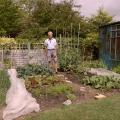 Charles standing in the small garden