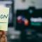 Someone holding a post-it with Python written on it