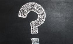 A question mark drawn with chalk