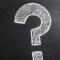 A question mark drawn with chalk