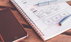 A notebook with wireframes