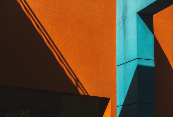 A building with orange and blue parts