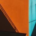 A building with orange and blue parts